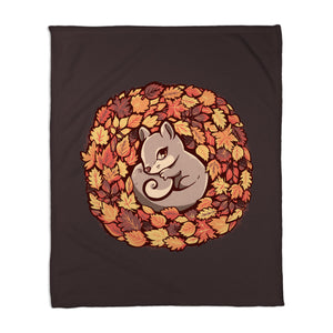 Squirrel Upon Autumn Leaves