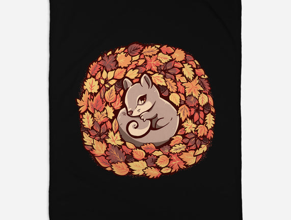 Squirrel Upon Autumn Leaves