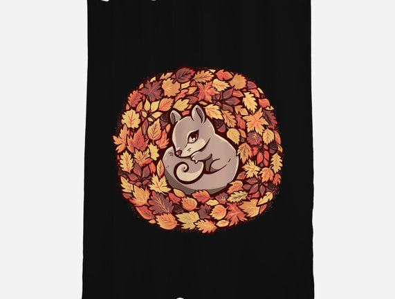 Squirrel Upon Autumn Leaves